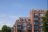 Photograph of apartment buildings on a sunny day